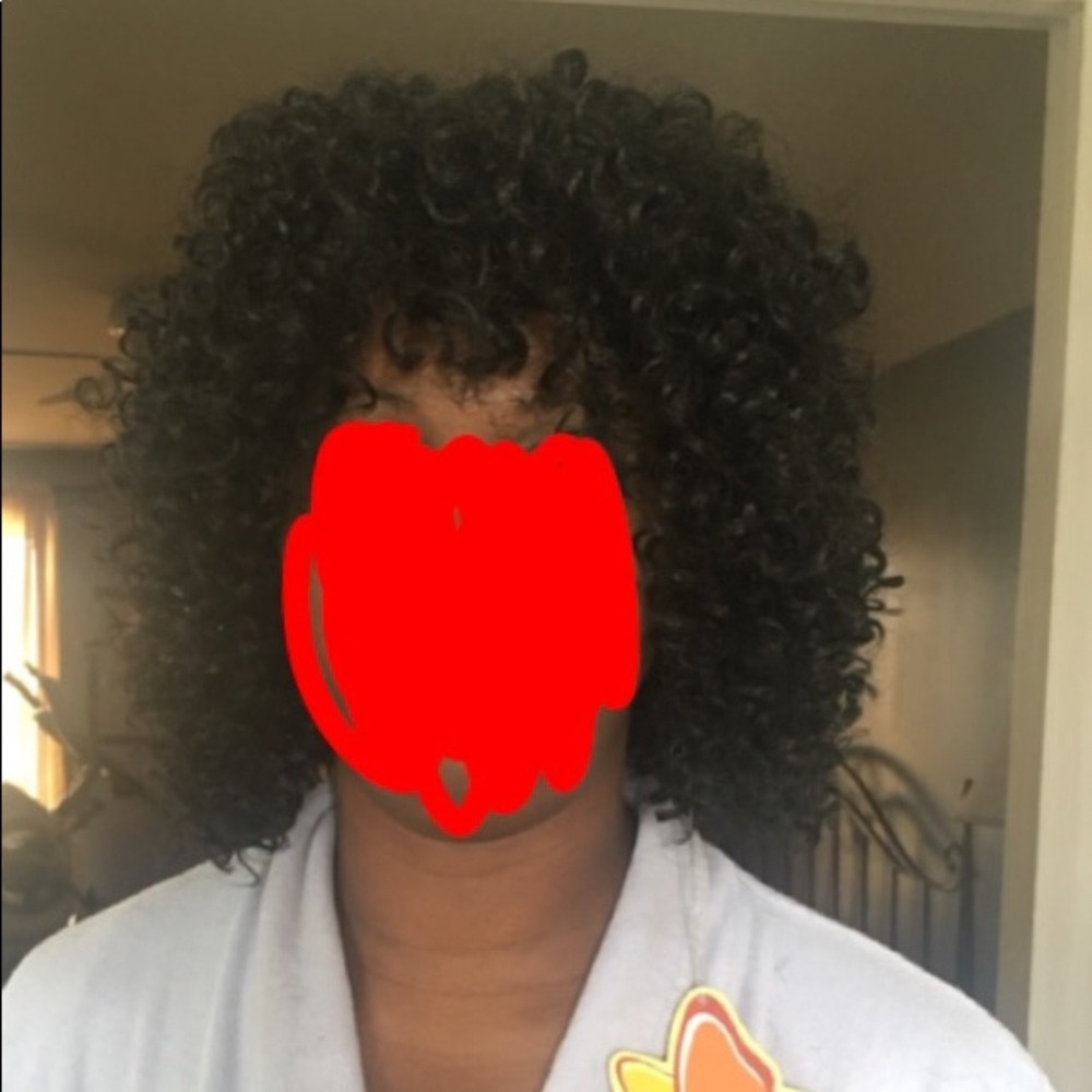 Curly synthetic wig.